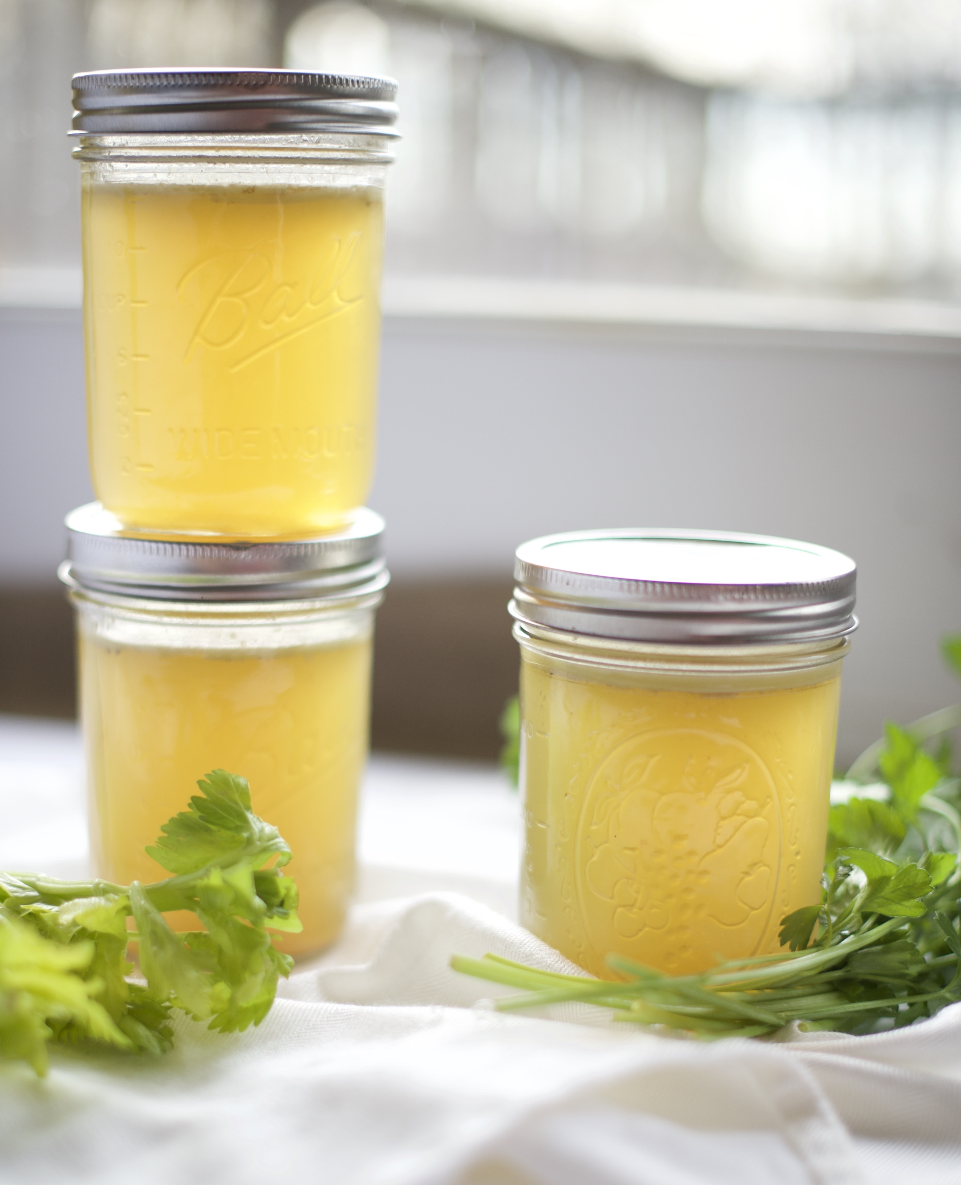 Photo of chicken stock in a jar