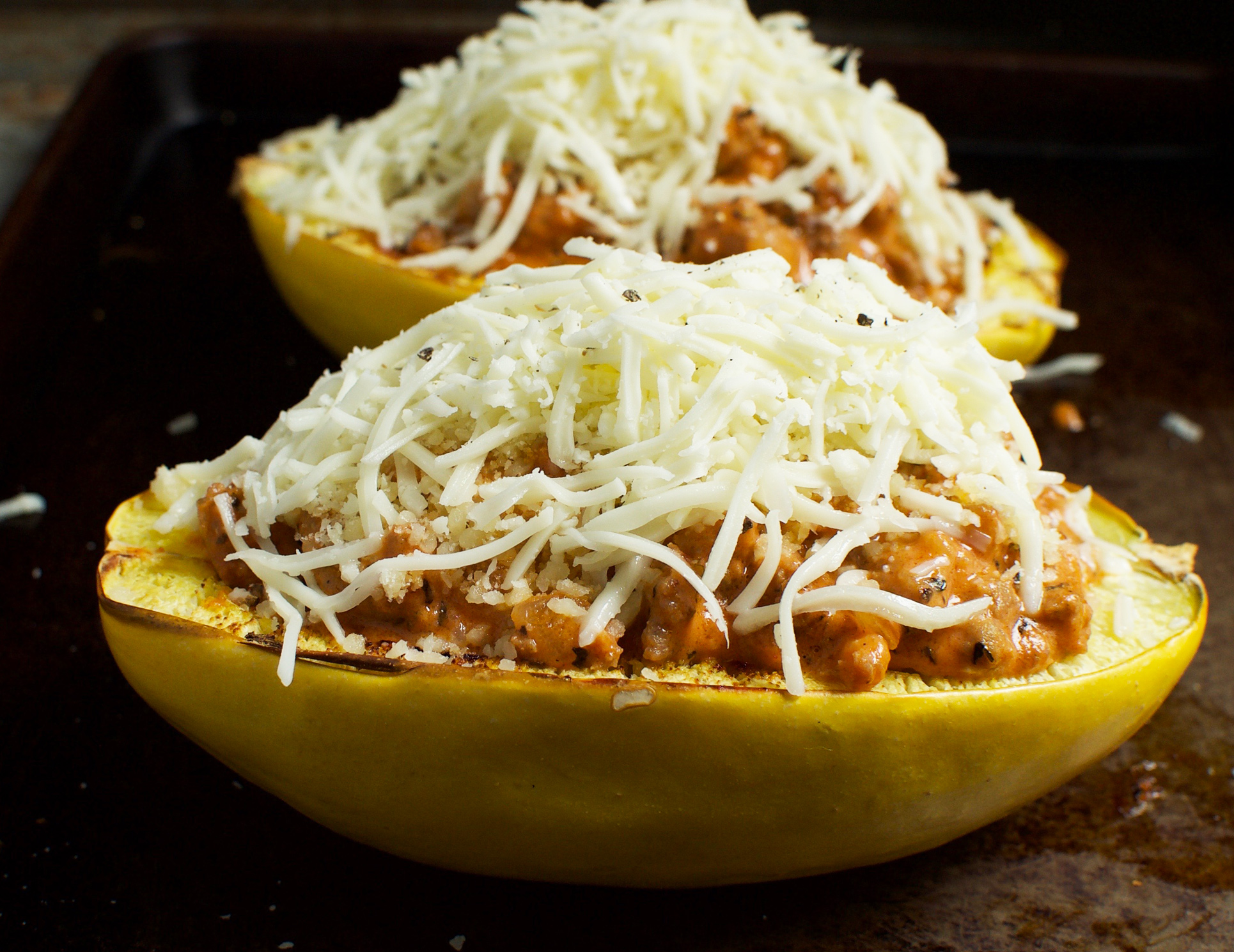 This recipe for Sausage Stuffed Spaghetti Squash takes low-carb eating to a new level! This delicious recipe works for low-carb, ketogenic, gluten-free, grain-free, diabetic, or Banting diets.