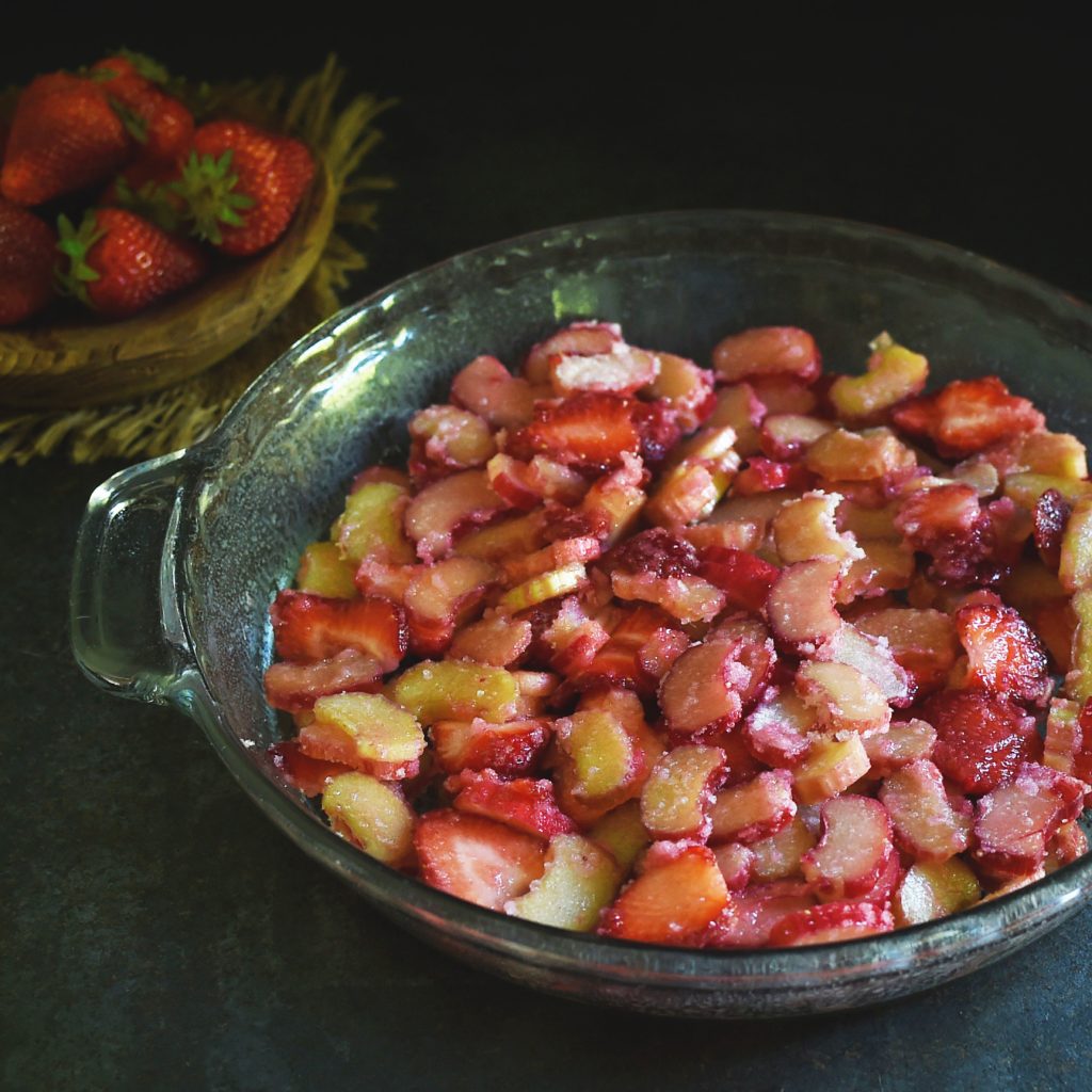 Low-Carb Strawberry Rhubarb Upside-Down Cake-Strawberries and Rhubarb in the baking dish.