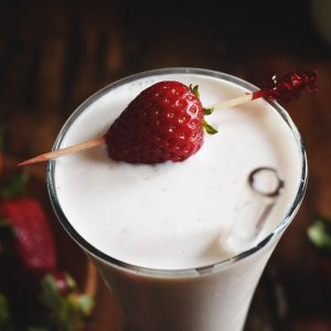 Low-Carb Strawberry Italian Cream Soda Recipe garnished with a strawberry!