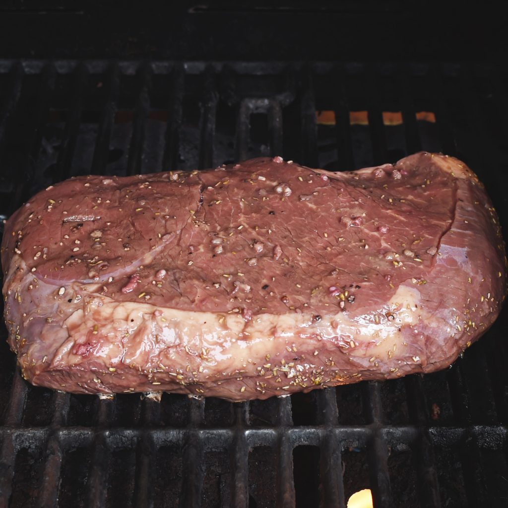 Grilled Marinated London Broil-grilling side one.