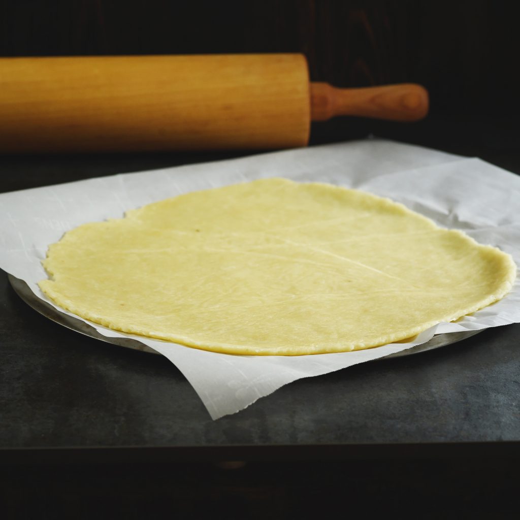 Low-Carb Pizza Crust Recipe-Rolled out crust ready for the oven.