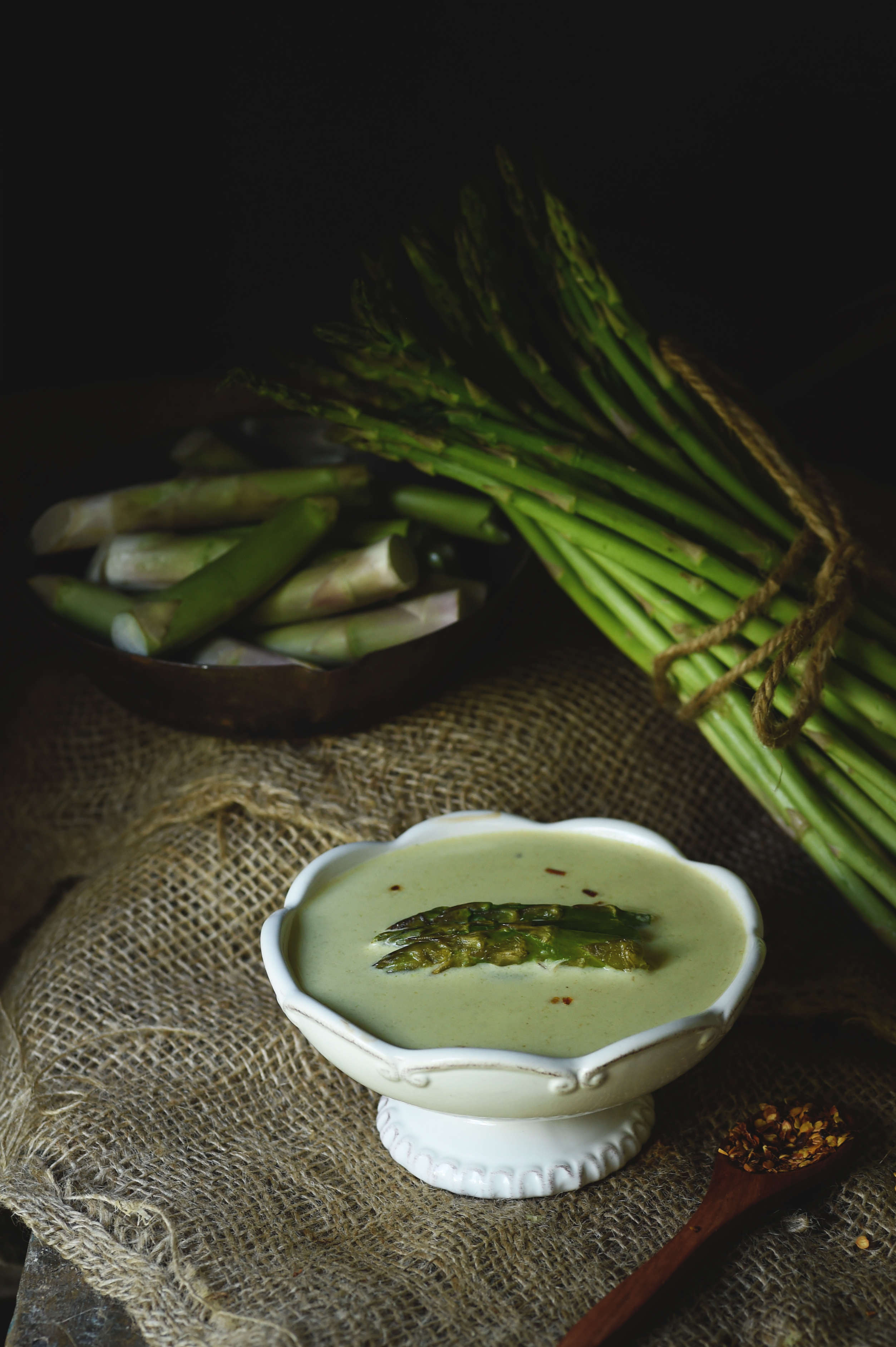 Low-Carb Cream of Roasted Asparagus Soup recipe-garnished with asparagus sprigs