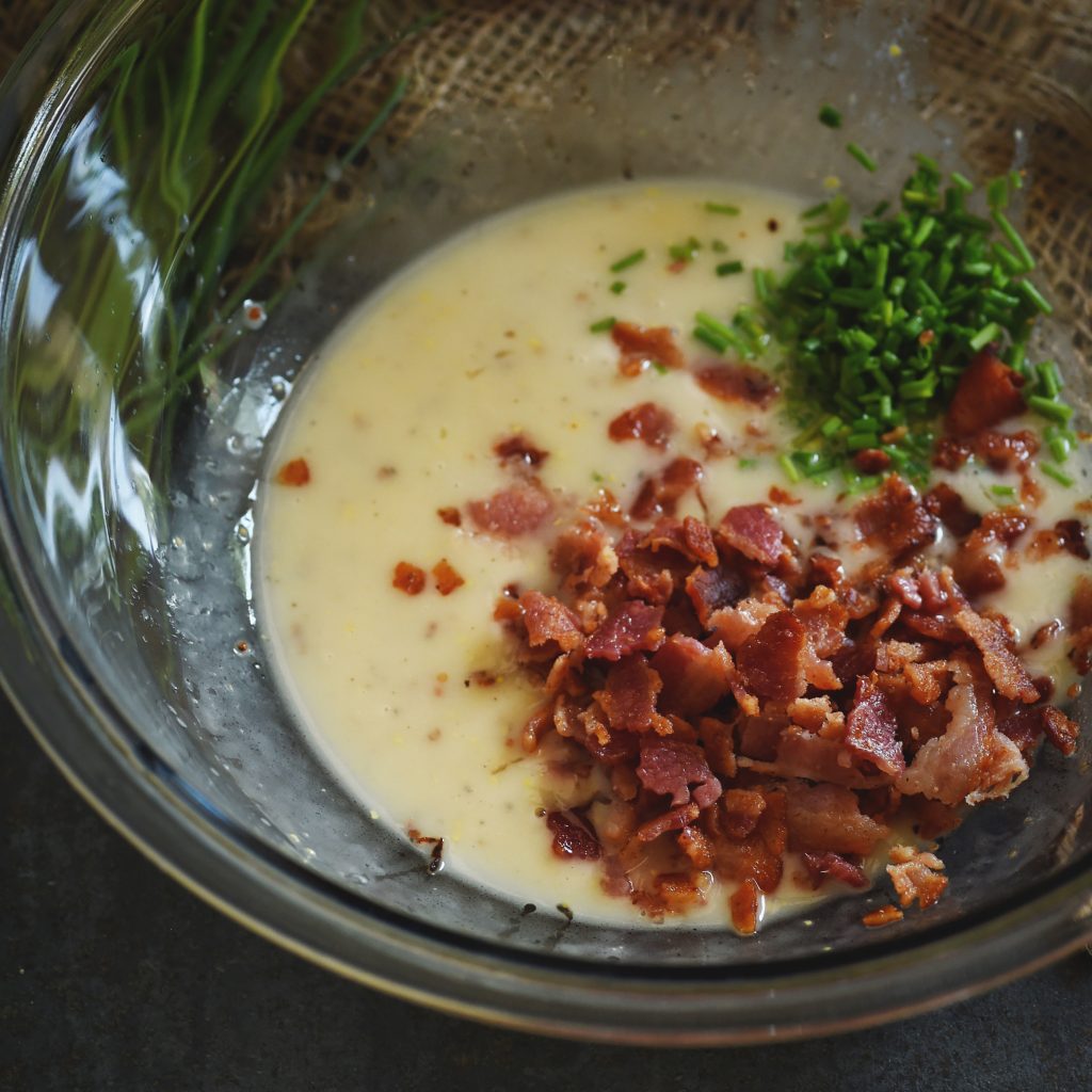 Low-Carb Bacon Vinaigrette Recipe-Adding the bacon and chives.