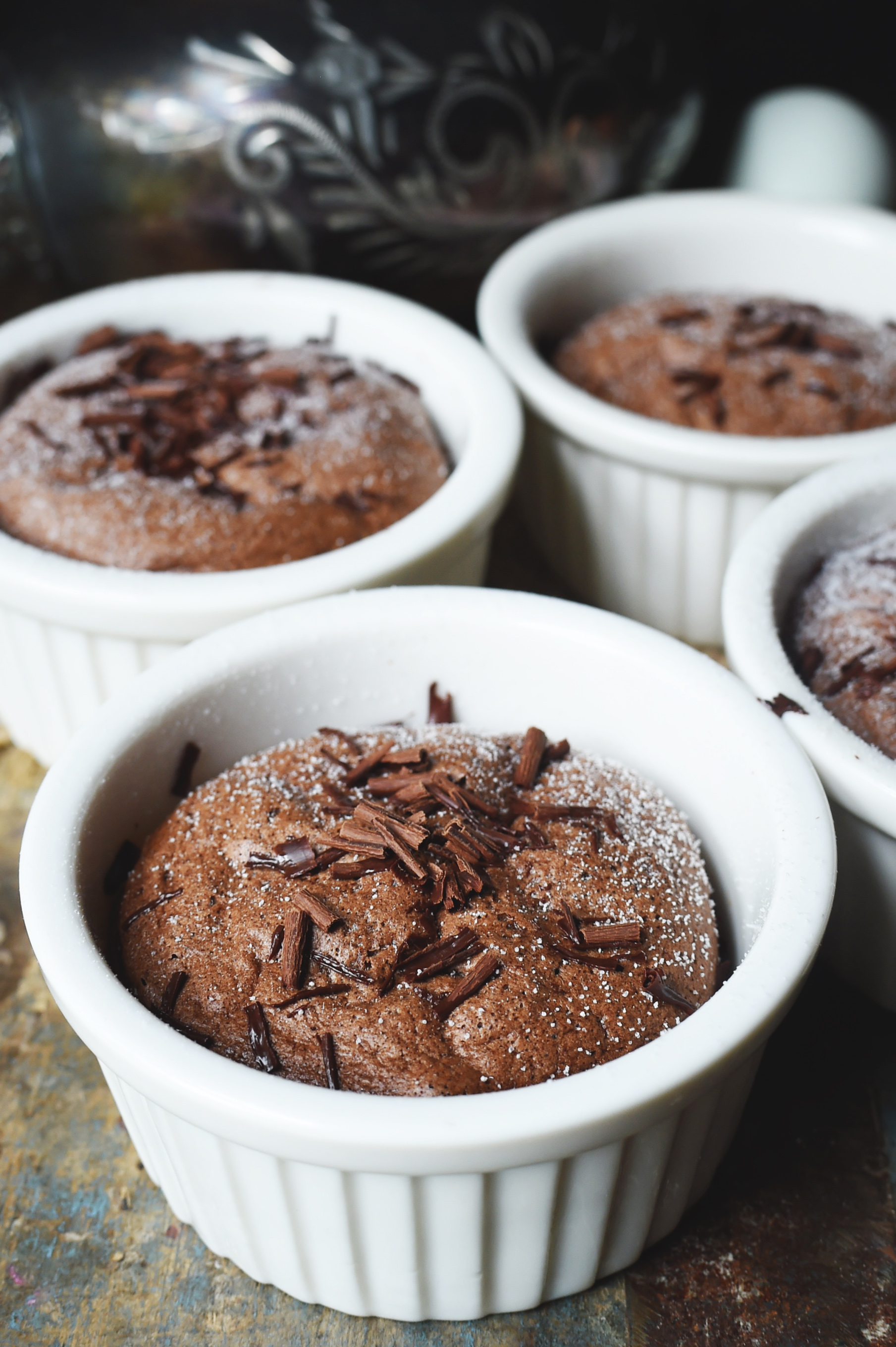 Low-Carb Chocolate Soufflé Recipe -with powdered sweetener and chocolate crumbles on top.