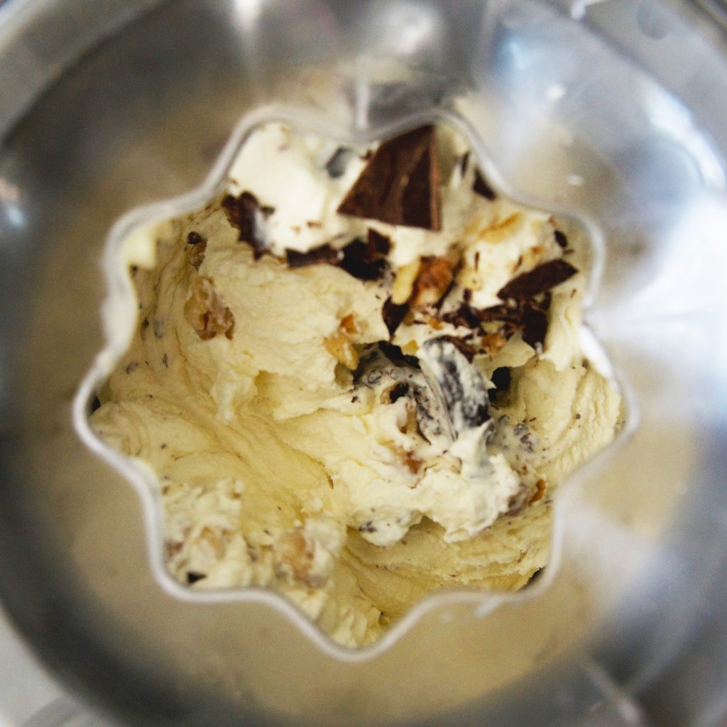 Keto-Friendly Chunky Monkey Ice Cream-Adding the walnuts and chocolate.