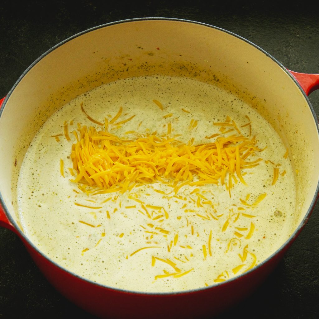 Low-Carb Broccoli Cheddar Soup Recipe-adding the cheese.