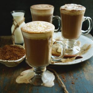 Keto-Friendly Sugar-Free Hot Chocolate Recipe -garnished with whipped cream and a dusting of cocoa