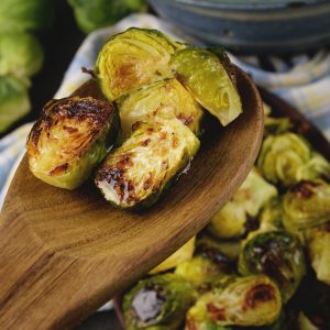 Easy Roasted Brussels Sprouts-on wooden spoon