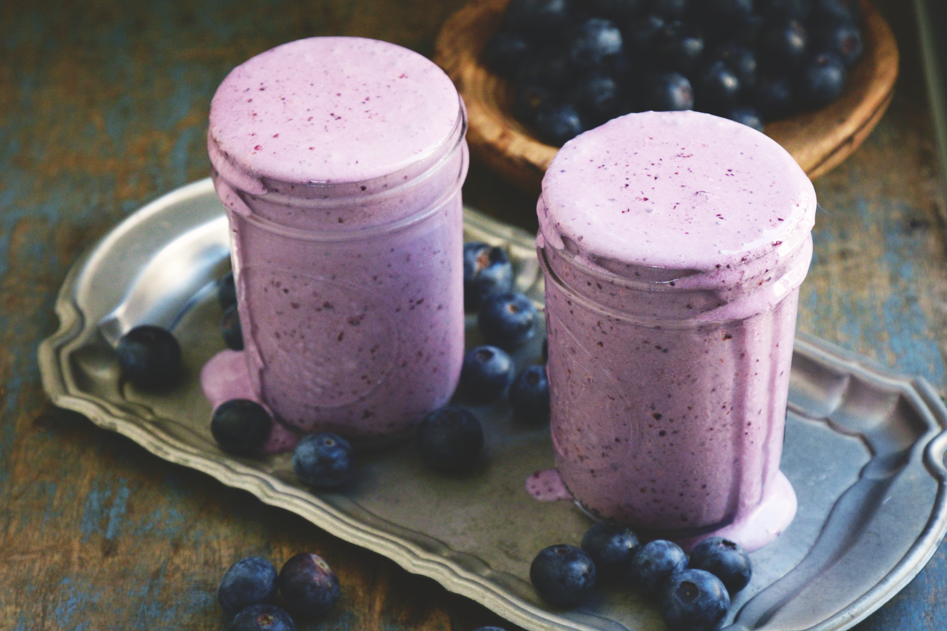 Low-Carb Blueberry Smoothie-Two servings on a tray.
