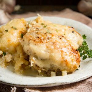 Low-Carb One Skillet Creamy Garlic Parmesan Chicken on a serving plate.