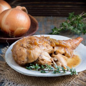 Photo of Easy Keto-Friendly Crockpot Chicken on a plate with sauce.