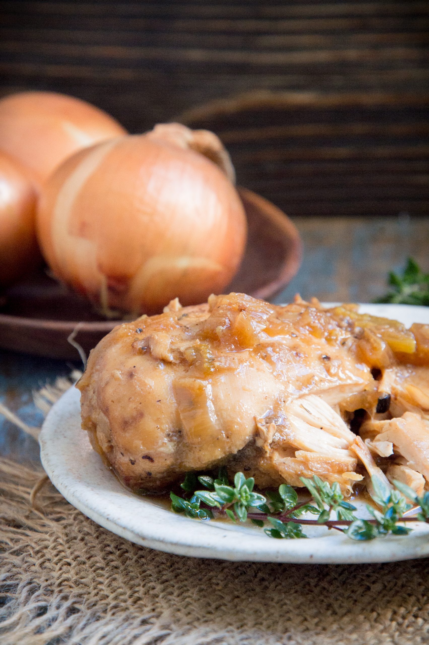 Easy Keto-Friendly Crockpot Chicken-garnished with thyme.