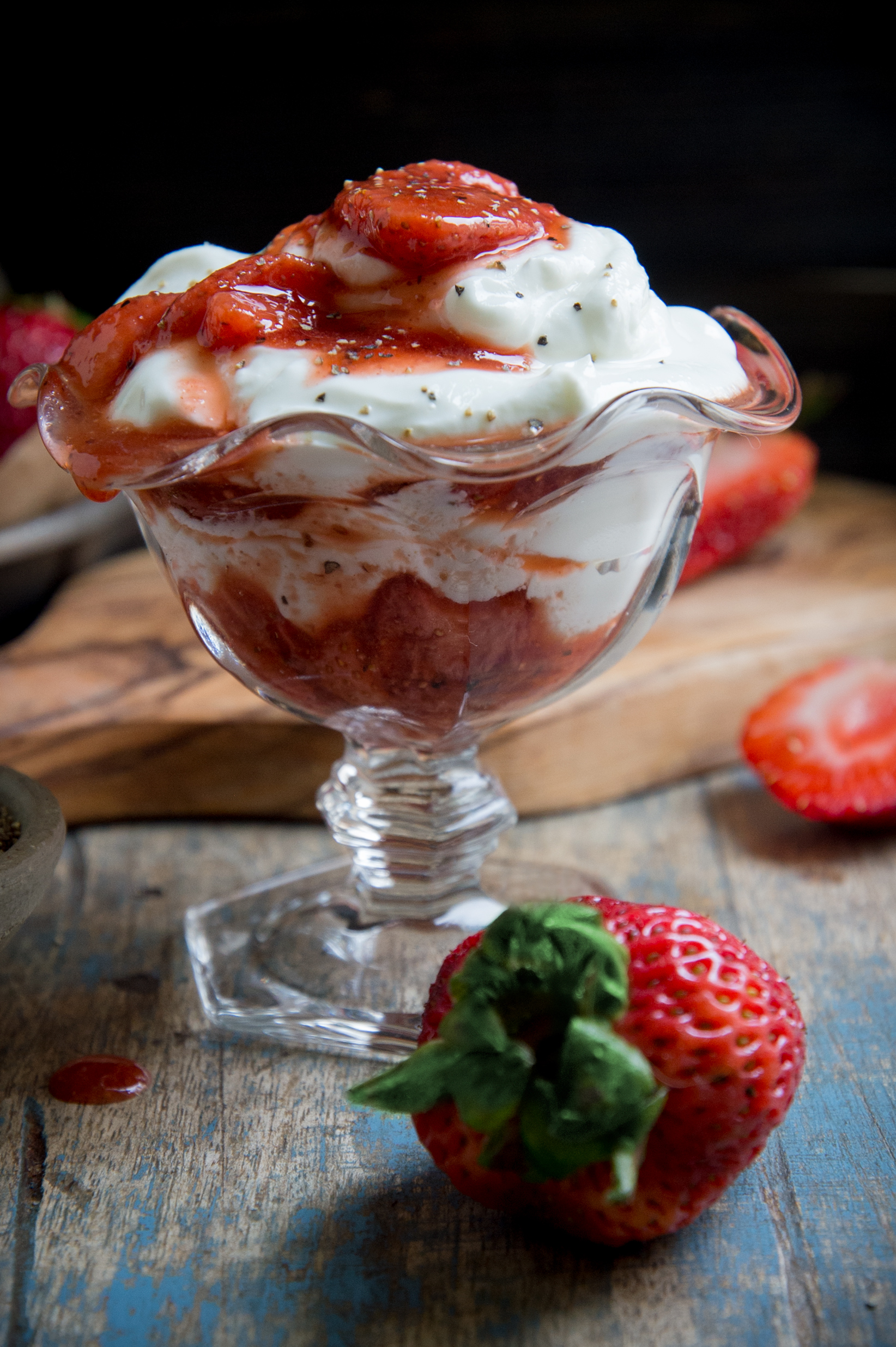 Balsamic Peppered Strawberry Sauce-served over yogurt.