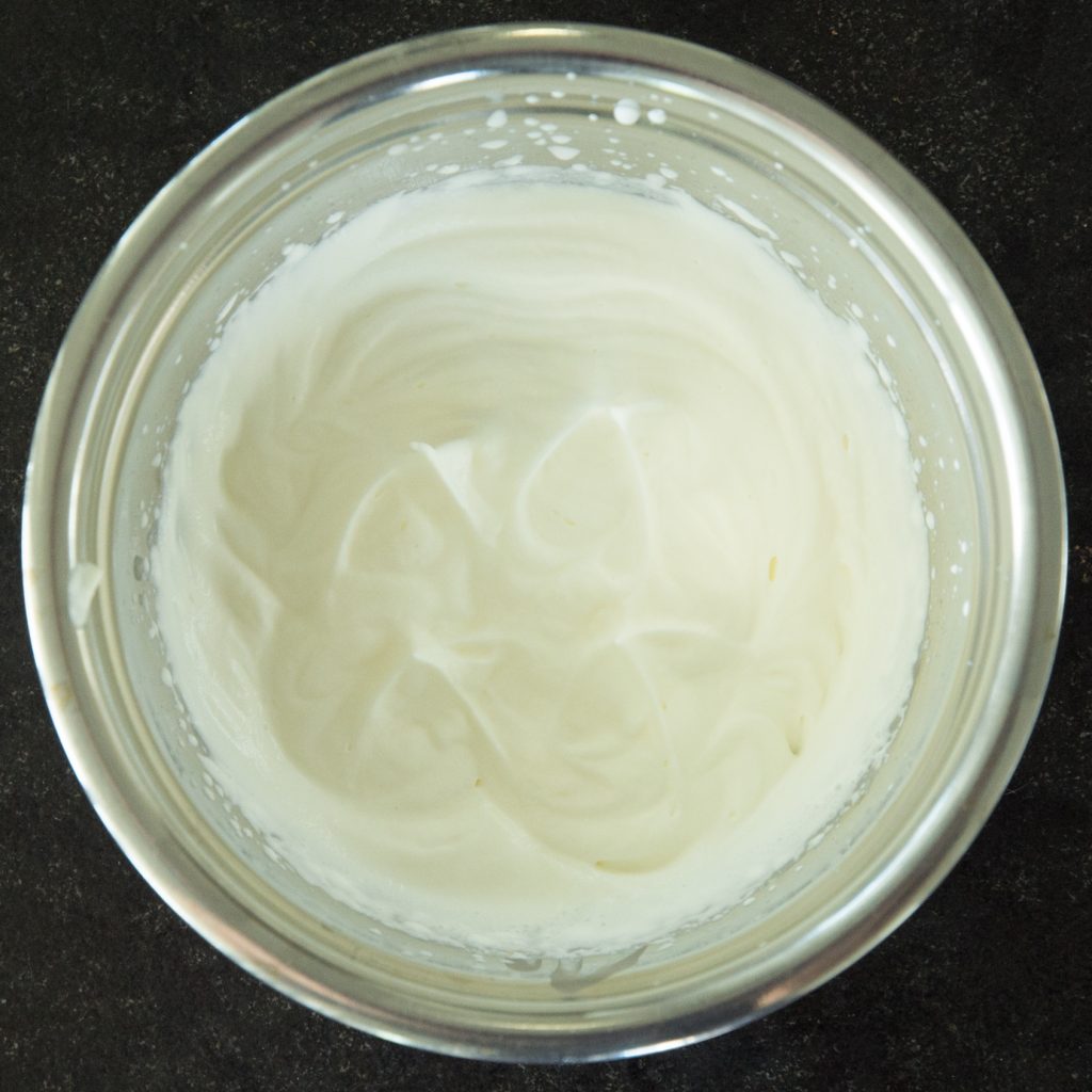 Process photo of whipped cream mixture.
