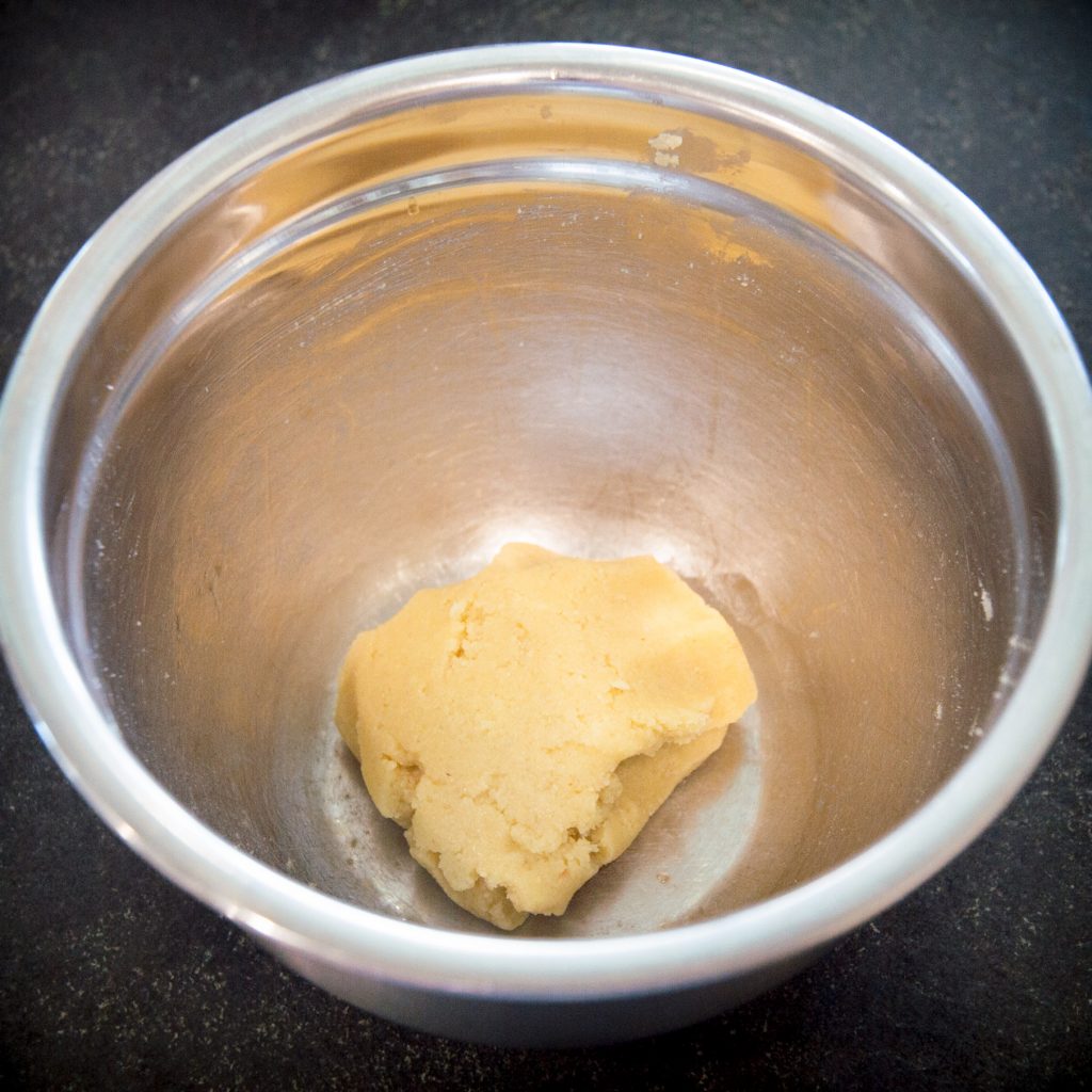 Process photo of finish dough for the cheesecake crust.