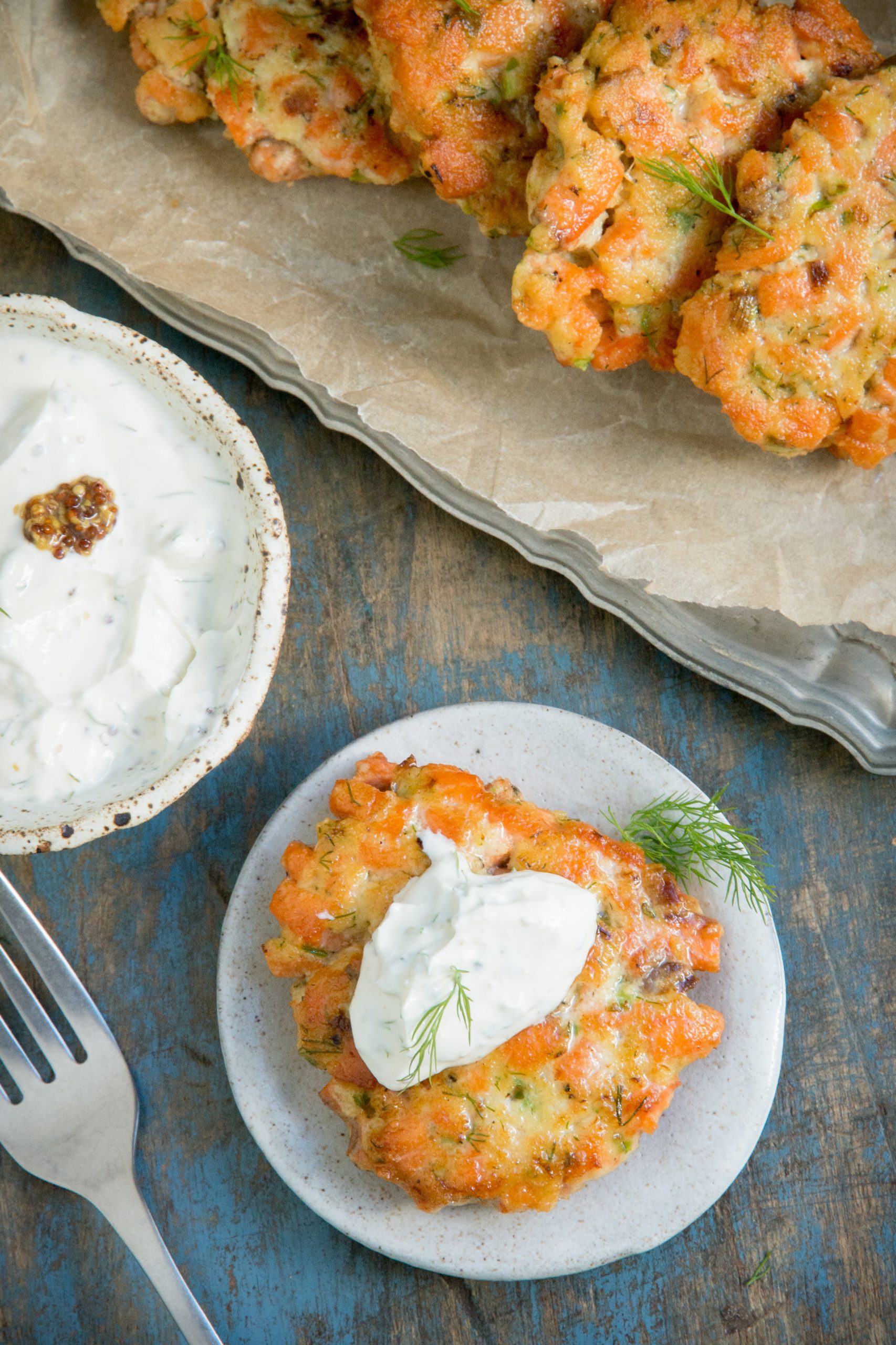 Salmon cake with dollop of sauce.