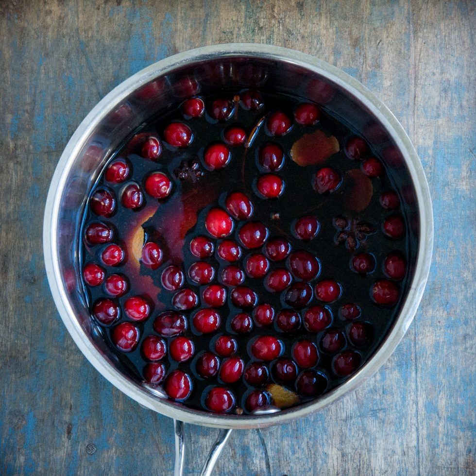 Simmering the cranberry mulled wine.