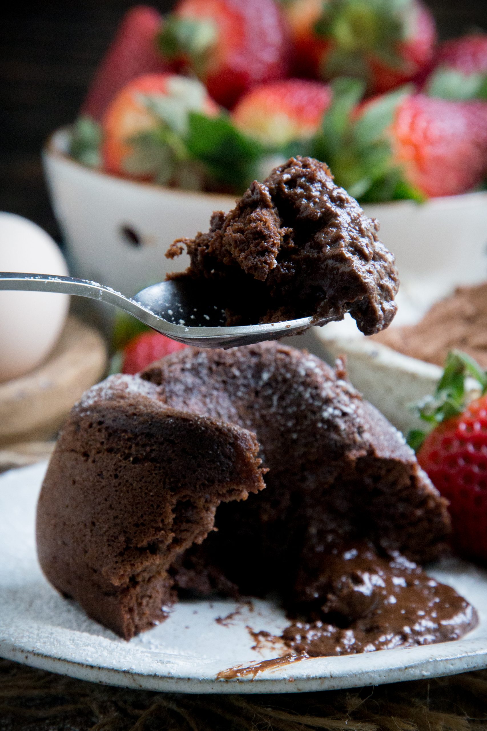 A spoonful of chocolate lava cake.