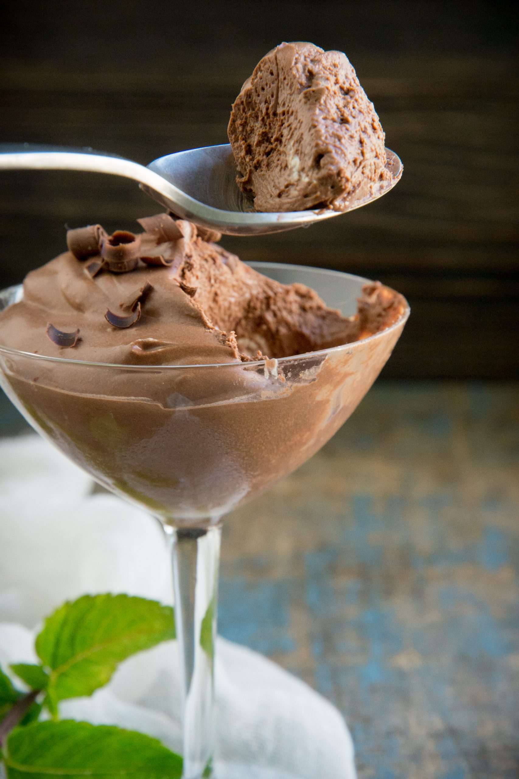 Taking a spoonful of keto chocolate mousse.