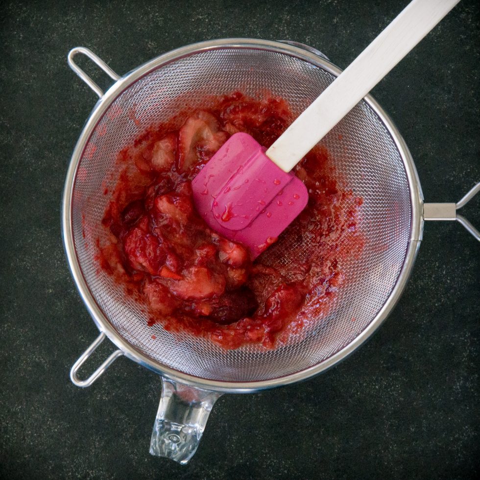 Making the strawberry juice.