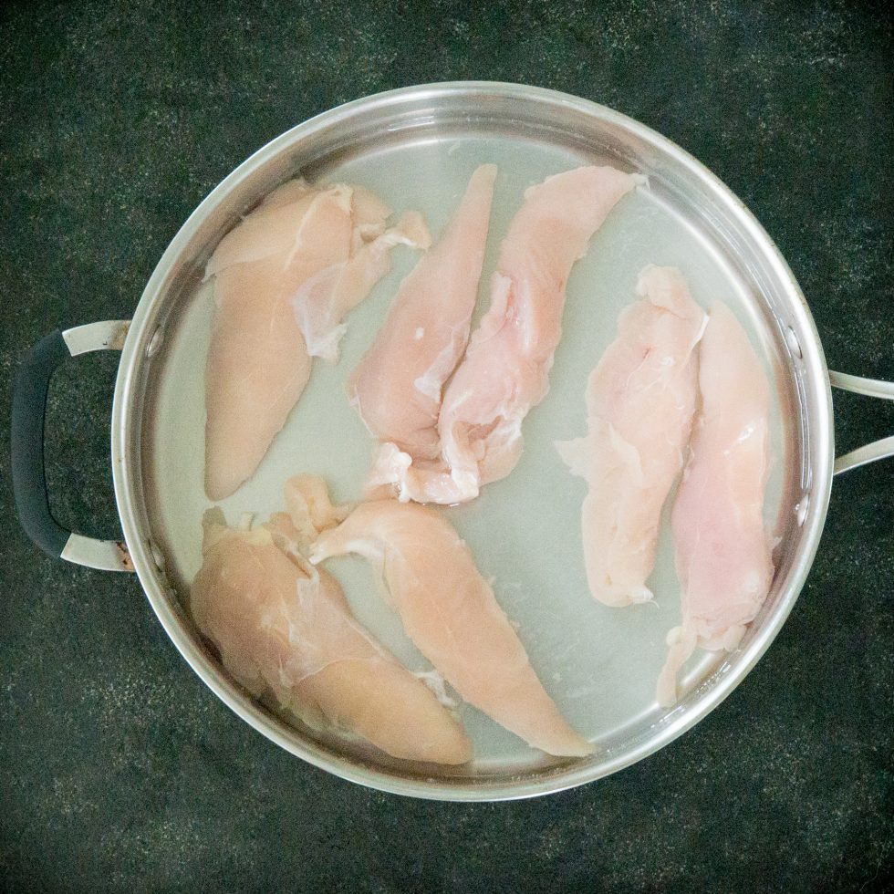Cooking the chicken for the chicken salad.