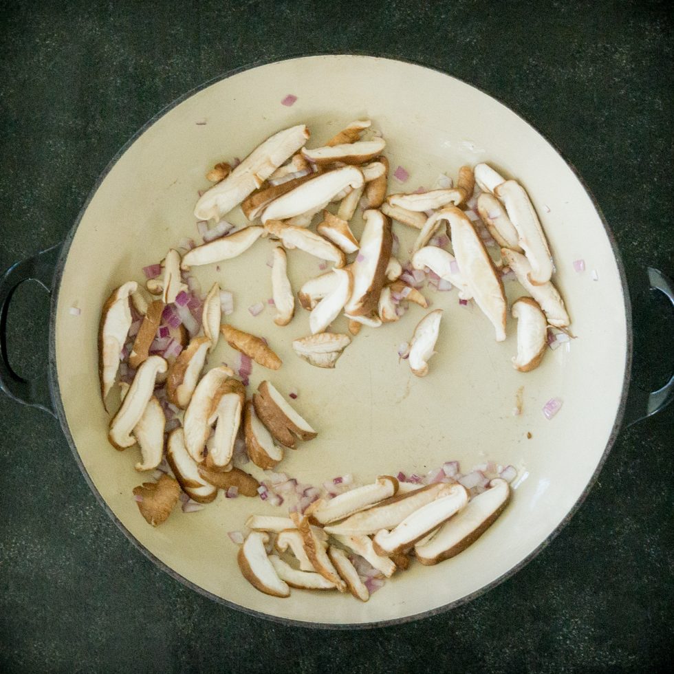 Cooking mushrooms and onions.