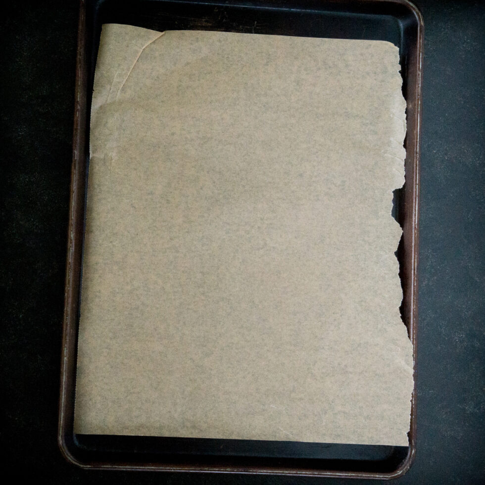 Baking sheet lined with parchment.